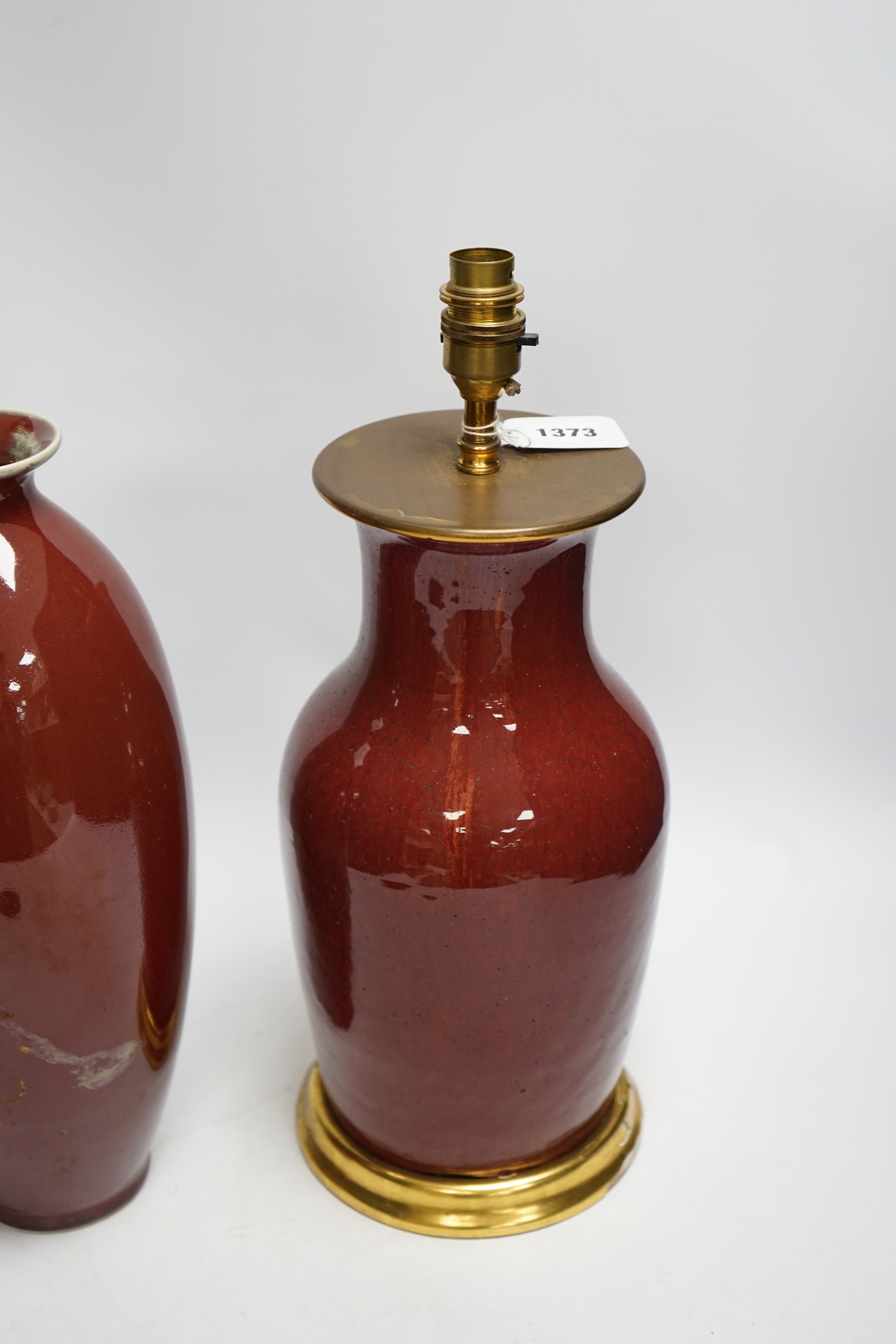 Two Chinese sang-de-boeuf vases, one mounted as a lamp, tallest 40cm total